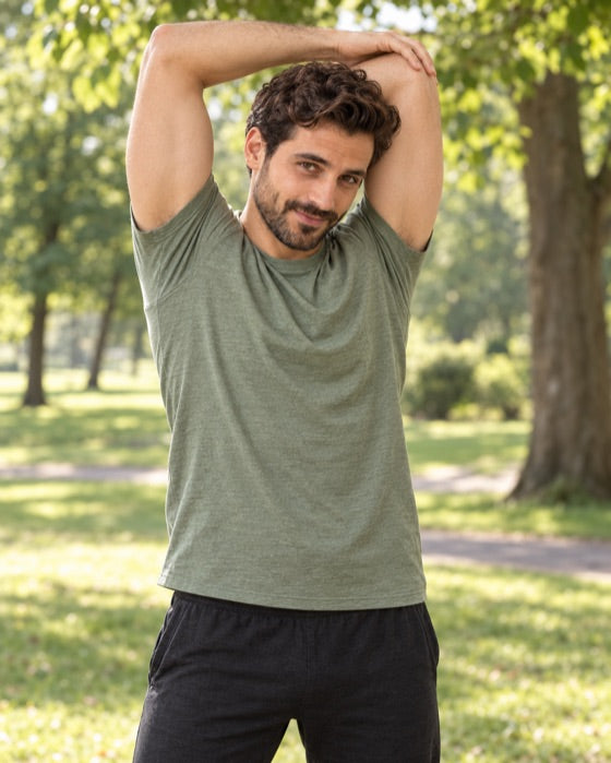 Man stretching outdoors in a park